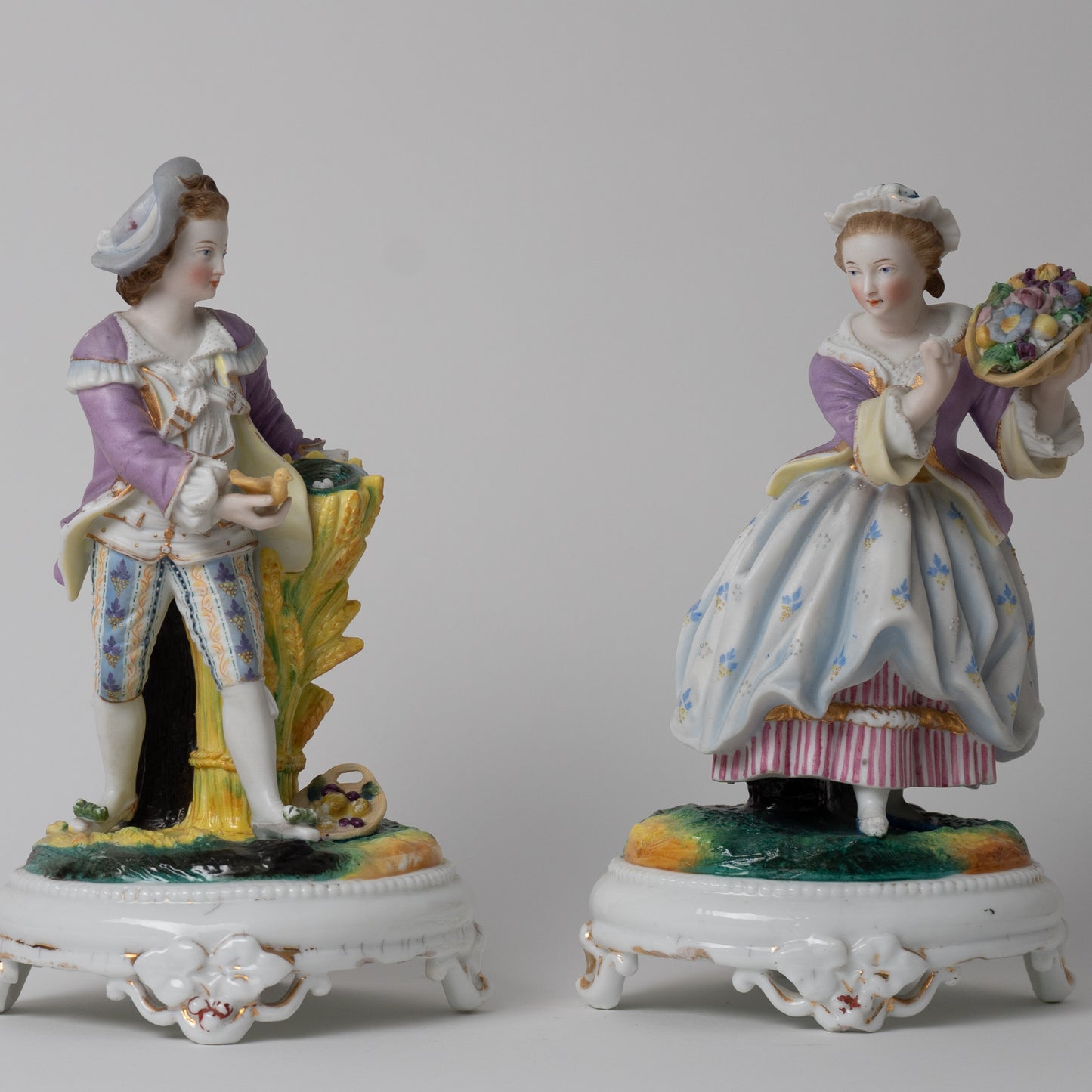 Coppia di sculture in porcellana biscuit XIX° secolo