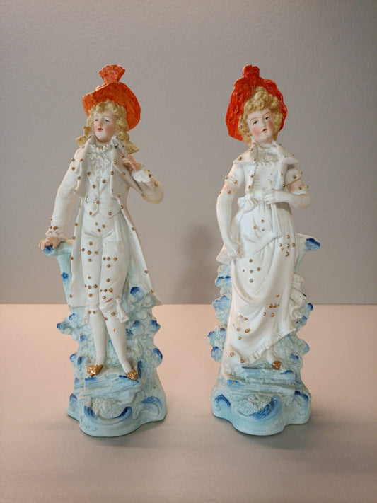 Coppia sculture "Lui e Lei" in porcellana biscuit